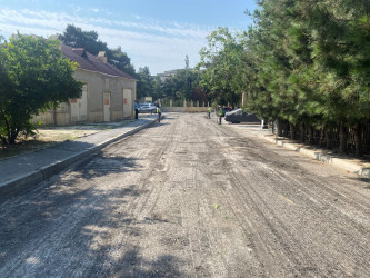 Nizami rayonunda yol infrastrukturunun yaxşılaşdırılması istiqamətində işlər davam etdirilir - 21-07-2026